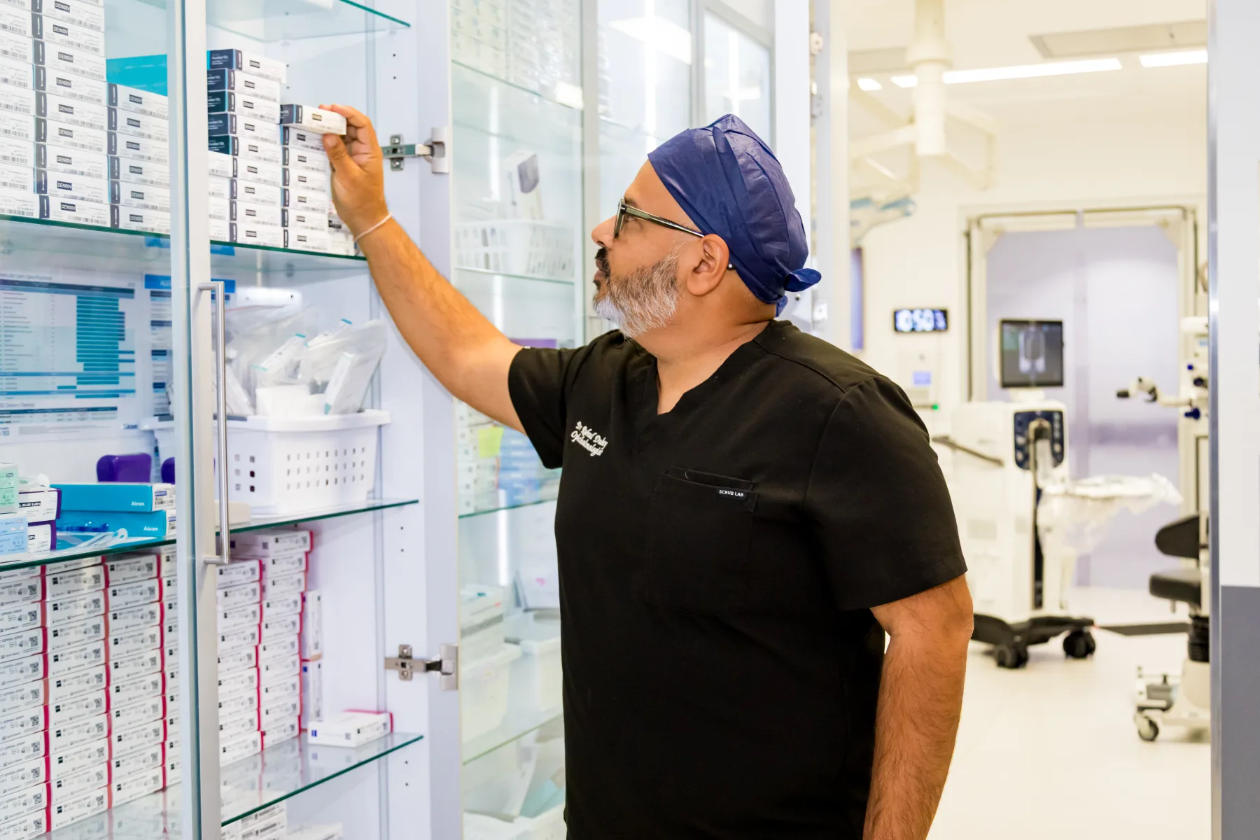 Dr Rahul Dubey preparing equipment in the operating theatre