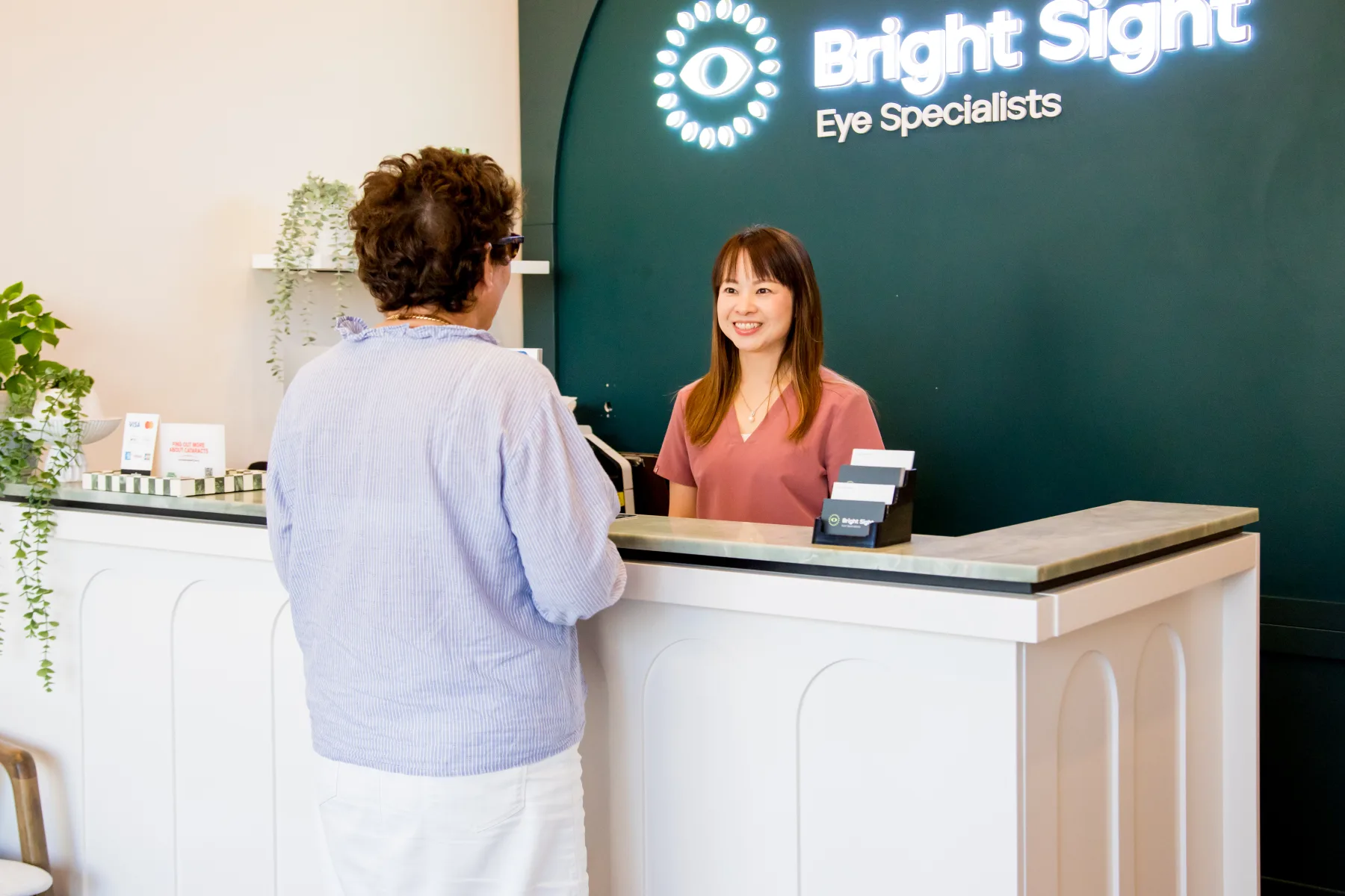 A patient receiving a warm welcome at Bright Sight Eye Specialists